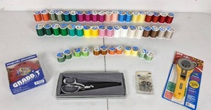 SewingQuilting Supplies Rotatry Cutter, Push Pins, Gingher Scissors, and Assortment of Thread