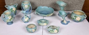 lot 8 image: Roseville Pottery White Rose Collection of 11 Pieces Cornucopia Vases, Planters, Bowls, Pitcher and More