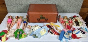 lot 11 image: Vintage Barbie Doll Collection with Clothes and Case