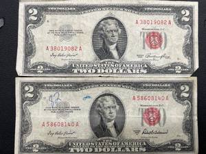 lot 27 image: 2 Red Seal $2 Dollar Bills
