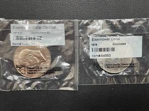 lot 51 image: 1973-D and 1976 Ike Dollar Coins