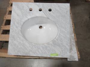 lot 406 image: 25 in. W Marble Vanity Top in Carrara with White Basin and Back Splash - Slight Scratches.