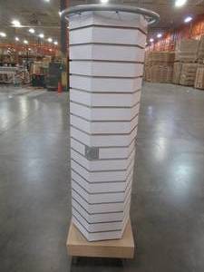 lot 503 image: 18 x 18 x 63 Hexagonal Display Rack - Hooks not included - Used in retail Store. Fixture is stationary, but on casters.