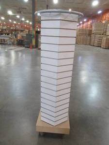lot 504 image: 18 x 18 x 63 Hexagonal Display Rack - Hooks not included - Used in retail Store. Fixture is stationary, but on casters.