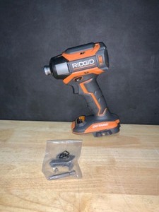 RIDGID 18V OCTANE Brushless Cordless 12 in. Impact Wrench (Tool Only) with Belt Clip. See Pictures