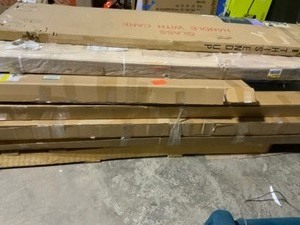 Pallet with Different Kinds of Closet Doors, Security Gate, Bed Frames, BlindsShades, & other Household Items. Various Conditions. See Pictures