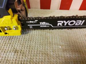 lot 106 image: Ryobi 139cc gas chain saw. Reconditioned
