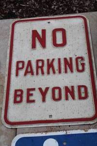 lot 635 image: No Parking Beyond Metal Sign