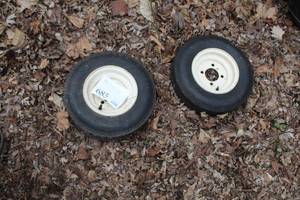lot 685 image: Lot of (2) 4.80-8 Utility Trailer Tires with 9 4-lug Rims