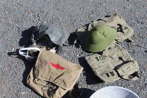 lot 871 image: Lot of (6) Vintage Military Equipment - Helmet, Gas Mask with Case, Carry Packs