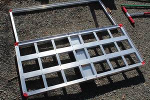 lot 874 image: Aluminum Travel Rack