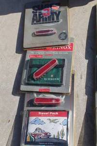lot 905 image: Lot of (3) Swiss Army Knives (New In Package )