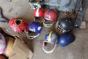 lot 935 image: Youth (4) Football Helmets, (1) Hockey Helmet, (1) Baseball Helmet,  (1) Football Shoulder Pads