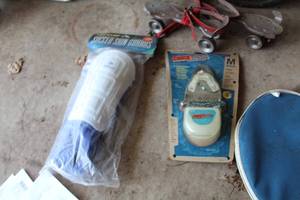 lot 937 image: One Pair Medium Soccer Shin Guards, (1) Mouth Guard (in original packaging)