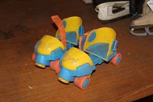 lot 740 image: Fisher Price Childrens Plastic Roller Skates