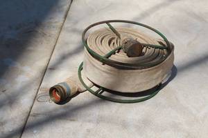 lot 762 image: 2 Cloth Hose on Reel