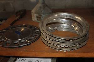 lot 765 image: Lot of (4) Chrome Wheel Trim Rings, Ford Hubcap