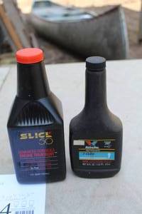 lot 1014 image: Valvoline 2-Cycle Lub 16-oz Plastic Bottle, Slick 50 Engine Treatment 1-Quart Plastic Bottle