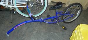 Instep kids bike that hooks up to the parents bike to learn to balance and ride
