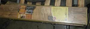 3 packages of TrafficMaster glueless laminate flooring woodgrain look (Lakeshore pecan) each bundle covers 24 sq ft