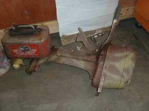 Vintage Mercury boat motor and gas can
