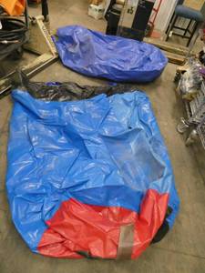 Two blue reinforced vinyl bags 58x60 and 48x54