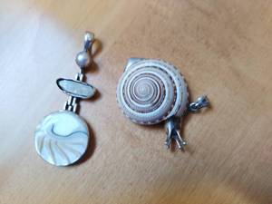 lot 151 image: Two Sterling Silver Pendants
