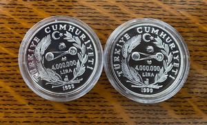 lot 500 image: Pair of .925 Sterling Silver Four Million Turkish Lira Total Solar Eclipse Coin