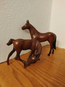 lot 76 image: Two Hand Carved Wood Horse Figurines