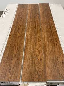 303 SF of Beautiful Waterproof LVP Flooring - Sundance Saddle