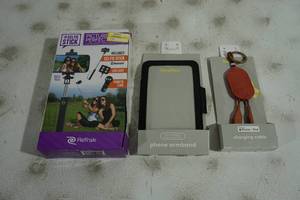 lot 137 image: NEW Phone Armband, Charging Cable, and Selfie Stick Kit