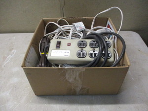 Large lot of extension cords and surge protectors