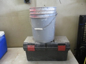 Toolbox and bucket of tools