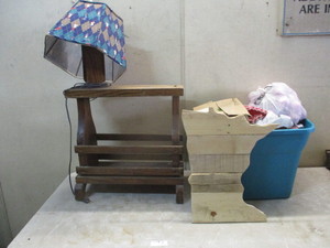 End table with lamp and other decor