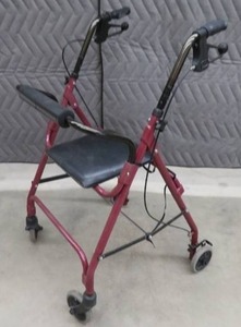 lot 52 image: WALKER WITH HAND BREAK