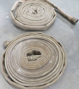 lot 38 image: 2 VINTAGE WATER (FIRE) HOSES