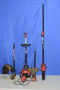 lot 32 image: Troy-Built Jump Start tool with multiple lawn attachments