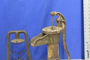lot 48 image: Water Pump and Oil Lamp for display