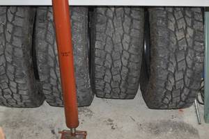 lot 15A image: Set of 4 lightly used. Toyo Open Country AT II Xtreme LT28565R18 125122S E 10 Ply AT All Terrain