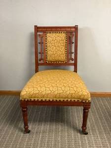 Antique Chair on Wheels