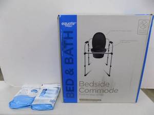 lot 12 image: Bedside Commode In Box