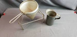 lot 49 image: Vintage Measuring Cup and Tomato Strainer