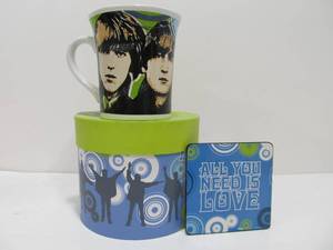 lot 147 image: New in Box BEATLES Coffee Mug