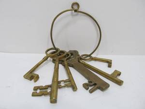 lot 149 image: Set of Oversize Solid Brass Decor Keys