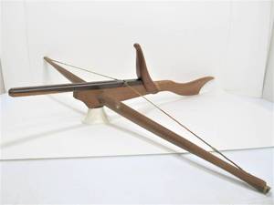 lot 97 image: Original Vietnam War Wooden Crossbow