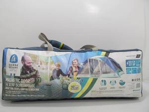 lot 100 image: 14 x 10 Sierra Designs Magnetic Door Screen House Tent