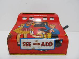 lot 278 image: Vintage Wolverine Tin Toy Adding Machine