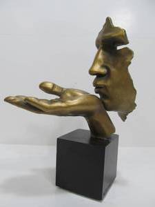 lot 289 image: Face & Hand Kiss Blowing Sculpture