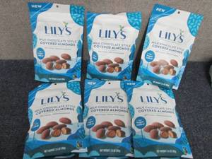 lot 96 image: 6- 3.5 oz Bags Lils Milk Chocolate...