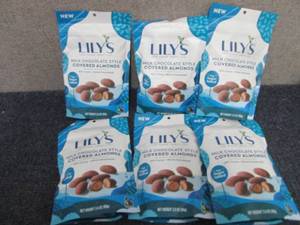 lot 97 image: 6- 3.5 oz Bags Lils Milk Chocolate...